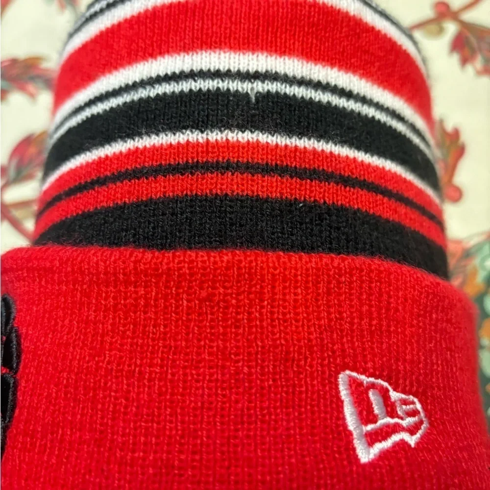 NEW ERA NBA TORONTO RAPTORS POM BEANIE STRIPED ADULT HAT RED BLACK MENS